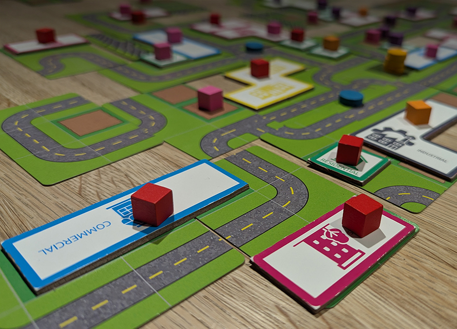 Showing the cards for roads and tiles for the buildings that players construct.